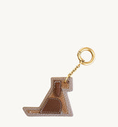 Songmont Puppy Charm: tan and brown leather dog charm with gold clip