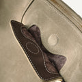 Extra Large Yore Hobo Bag in Dune Suede, with leather trim pocket, white stitching, and gold zipper.