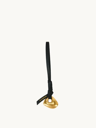 Faith Stone Charm in onyx with gold pendant and black leather strap, featuring 'Songmont' logo.