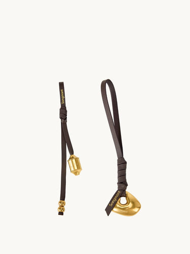 Faith Stone & Prayer Wheel Charm set, Sandal leather with gold metal charms and Songmont logo.