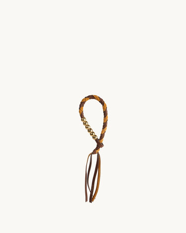 Braided leather cord with gold beads and leather tassels, the Freedom Cord