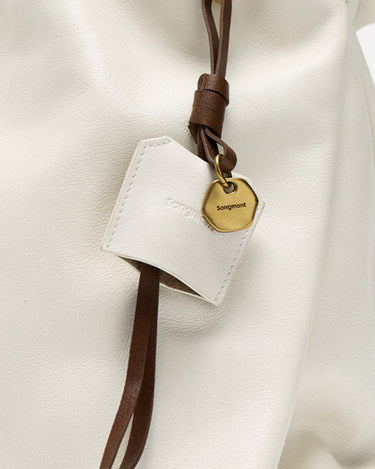 Cloud Gather Clutch Set with gold Songmont charm and embossed logo