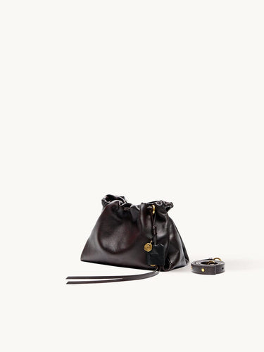 Gather Clutch Set in Ebony, made of full-grain Nappa leather with stainless steel hardware and a two-tone effect.