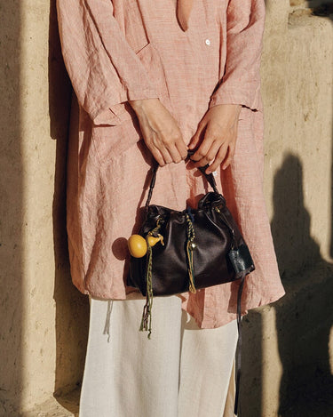 Gather Clutch Set in ebony leather with yellow gourd charm
