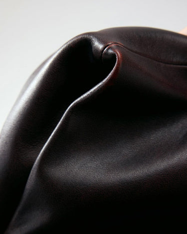 Ebony Gather Clutch Set in full-grain Nappa leather, featuring rich texture and subtle tonal variations.