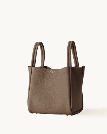 Taupe full-grain leather Large Song Bag with double top handles and subtle gold-tone hardware.