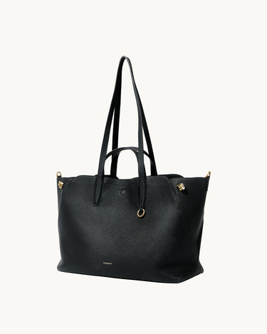 Large Yore Tote Bag in Onyx black full-grain leather with gold hardware. Spacious, shape-shifting design.