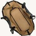 Black leather Large Yore Tote Bag with open interior, showcasing tan lining and internal pockets.
