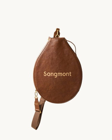Brown vegetable-tanned leather tennis racket cover with 'Songmont' embossed in gold.