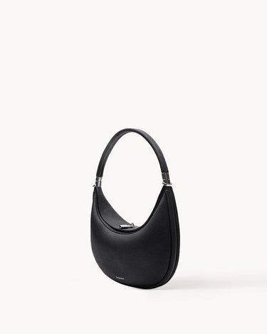 Black Luna Bag with silver-tone hardware, made of full-grain leather, curved shoulder bag