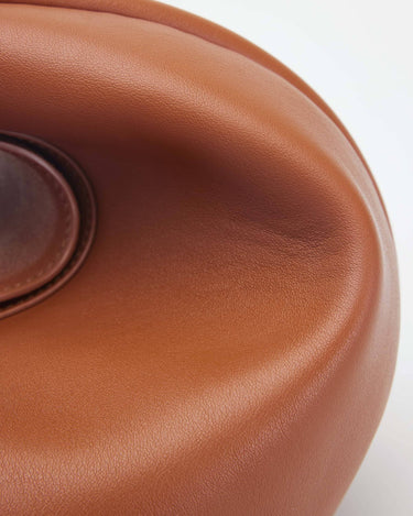 Luna Bag in Eco Caramel, crafted from textured vegan leather with a smooth finish.
