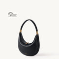 Black vegan leather Luna Bag with gold hardware and a crescent moon shape, featuring Global Recycled Standard certification.
