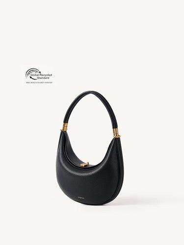 Black vegan leather Luna Bag with gold hardware and a crescent moon shape, featuring Global Recycled Standard certification.