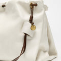 Medium Gather Bag Set in Cloud white leather with dark brown accents and Songmont logo tag.