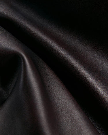 Ebony full-grain nappa leather texture on the Medium Gather Bag Set.