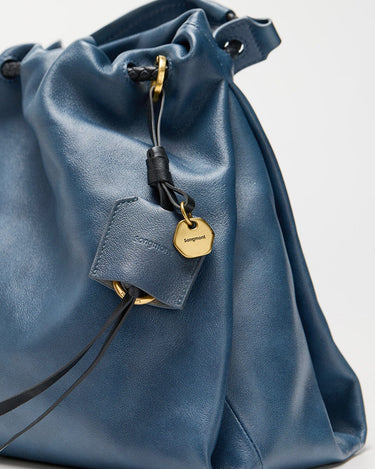 Medium Gather Bag Set in navy blue leather with gold hardware and Songmont logo charm.