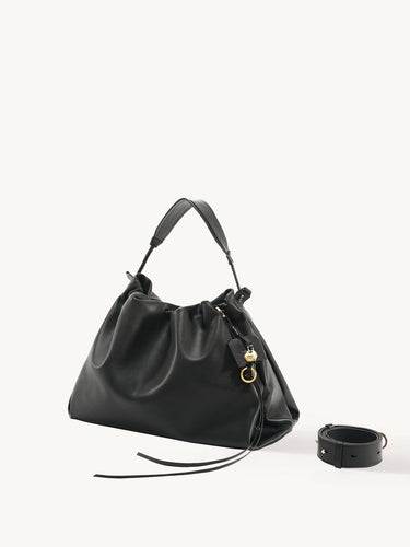 Black leather Medium Gather Bag Set with gold hardware and a separate rolled strap.