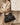 Medium black leather Gather Bag Set with a drawcord closure and beaded handle