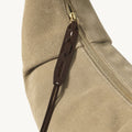 Large Luna Hobo Bag in Dune Suede with brown leather zipper pull featuring Songmont logo