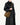 Medium Song Bag in Agarwood brown suede with gold hardware, worn by a person in a black leather coat.
