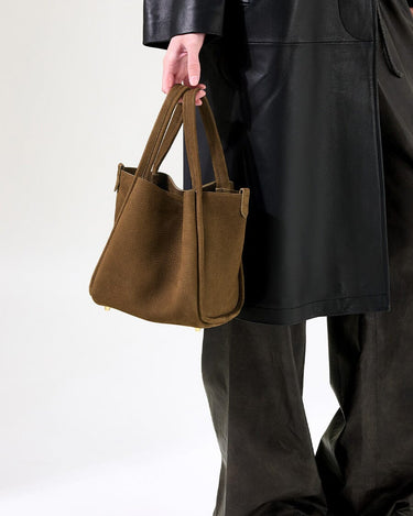 Medium Song Bag in Agarwood nubuck leather, structured trapezoid shape, double handles.