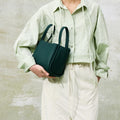 Medium Song Bag in Emerald green pebble-grain leather with dual top handles