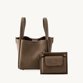 Medium song bag in taupe full-grain leather with magnetic closure and separate zip pouch