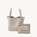 Medium Song Bag in Ivory pebble leather with detachable pouch.