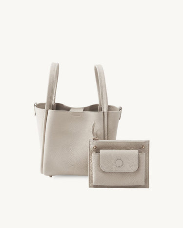 Medium Song Bag in Ivory pebble leather with detachable pouch.