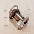 Onyx medium Song Bag interior with wallet, iPhone, compact, pouch, notebook, and 350ml water bottle.