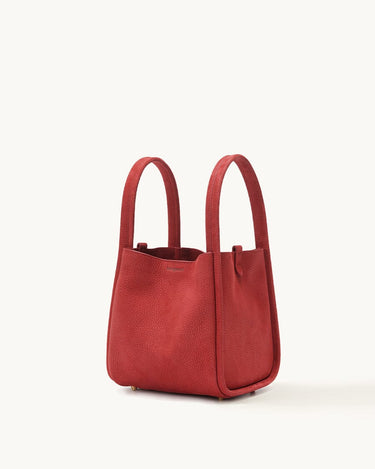 Medium Song Bag in Lucky Red pebbled leather, with top handles and gold feet.