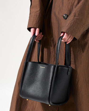 Medium Song Bag in Eco Onyx vegan leather, featuring a pebbled texture and embossed logo.