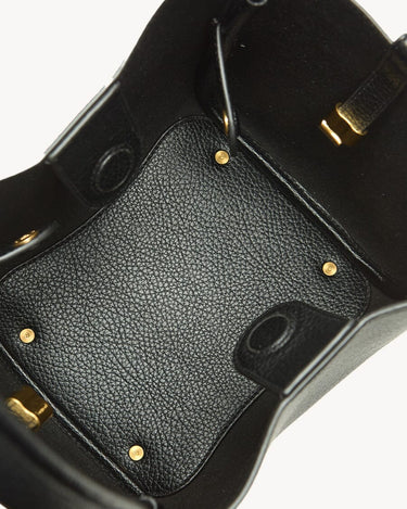 Black vegan leather Medium Song Bag interior with textured lining and gold hardware