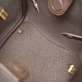 Interior of the Medium Song Bag in Eco Taupe vegan leather, showing textured lining and inner pouch.
