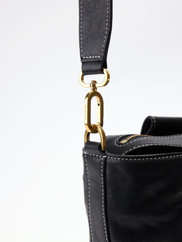 Black Yore Duffle Bag with gold 'Songmont' clasp and white stitching