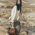 Brown Yore Hobo Bag in Sandal, made of vegetable-tanned leather with textured finish, spacious interior, ideal for everyday carry.