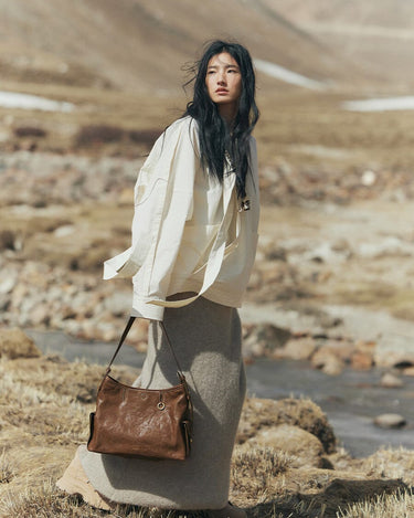 Brown Yore Hobo Bag in Sandal, made of vegetable-tanned leather with textured finish, spacious interior, ideal for everyday carry.
