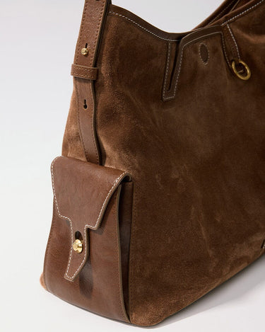Medium Yore Hobo Bag in Sandal Suede leather with a front flap pocket and gold clasp.