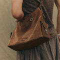 Medium Yore Hobo Bag in Sandal Suede with textured cow suede and vegetable-tanned leather accents.