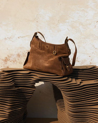 Medium Yore Hobo Bag in Sandal Suede, featuring cow suede leather and vegetable-tanned leather with gold-toned hardware.