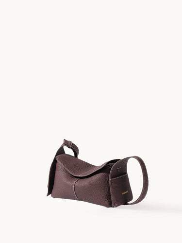 Burgundy Mini Drippy Roof Bag in textured full-grain leather with white stitching.
