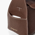 Brown pebbled leather Mini Drippy Roof Bag, white stitching, front pocket with earbud case, Songmont logo.