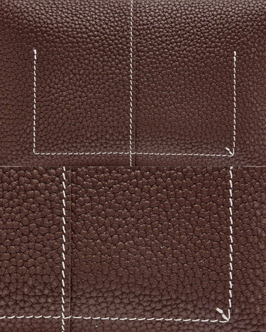 Chocolate Mini Drippy Roof Bag with white stitching detail on textured leather