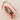 Pink textured leather Mini Drippy Roof Bag, organized interior with wallet, iPhone 15, notebook, lipstick, hand cream, AirPods.