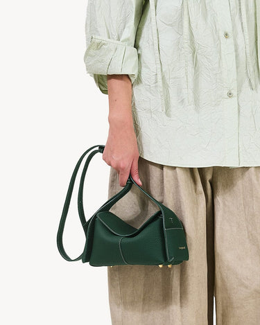 Mini Drippy Roof Bag in Emerald green textured leather with architectural design and gold feet.