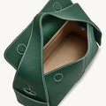 Emerald green Mini Drippy Roof Bag in textured leather with white stitching, showing open interior and flap closure.