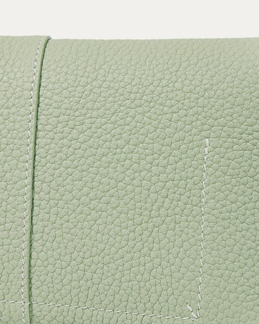 Pale green full-grain leather mini drippy roof bag with white stitching detail.