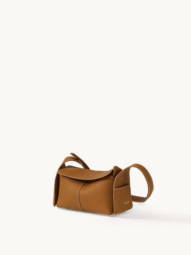 Mini Drippy Roof Bag in Mocha, a compact leather shoulder bag with a flap closure and textured finish.