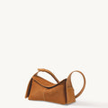 Mini Drippy Roof Bag in Sea Buckthorn nubuck leather, featuring a unique architectural design and adjustable strap.