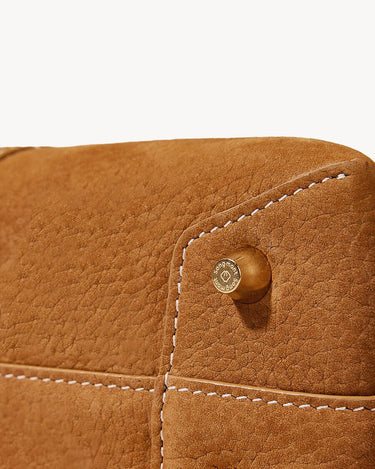 Songmont Mini Drippy Roof Bag in Sea Buckthorn nubuck leather with white stitching and gold logo stud.